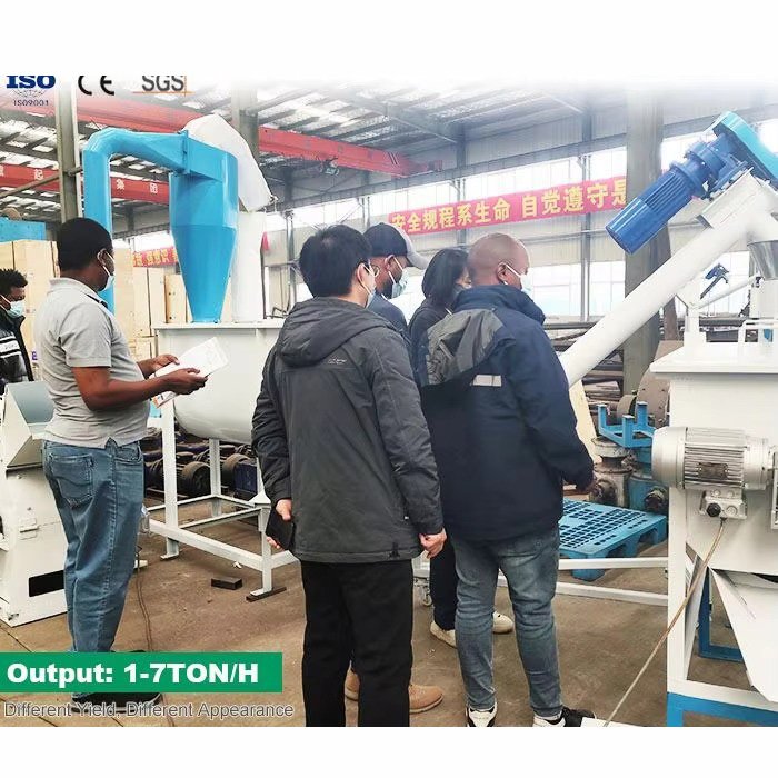 MAIKONG manufacturing facility showing production floor with fish feed equipment assembly and quality control testing areas