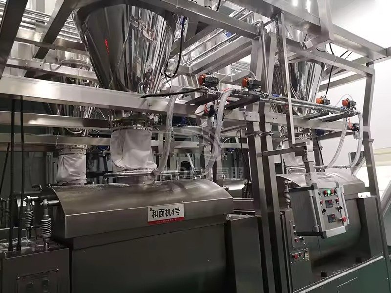 MAIKONG manufacturing facility showing production floor with fish feed equipment assembly and quality control testing areas