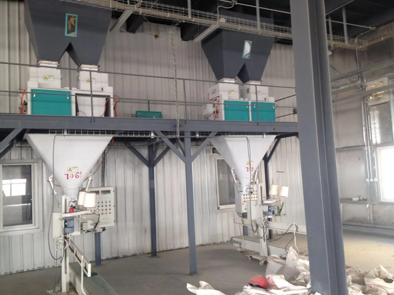 Aquatic fish feed production line showing extruder and oil coating system